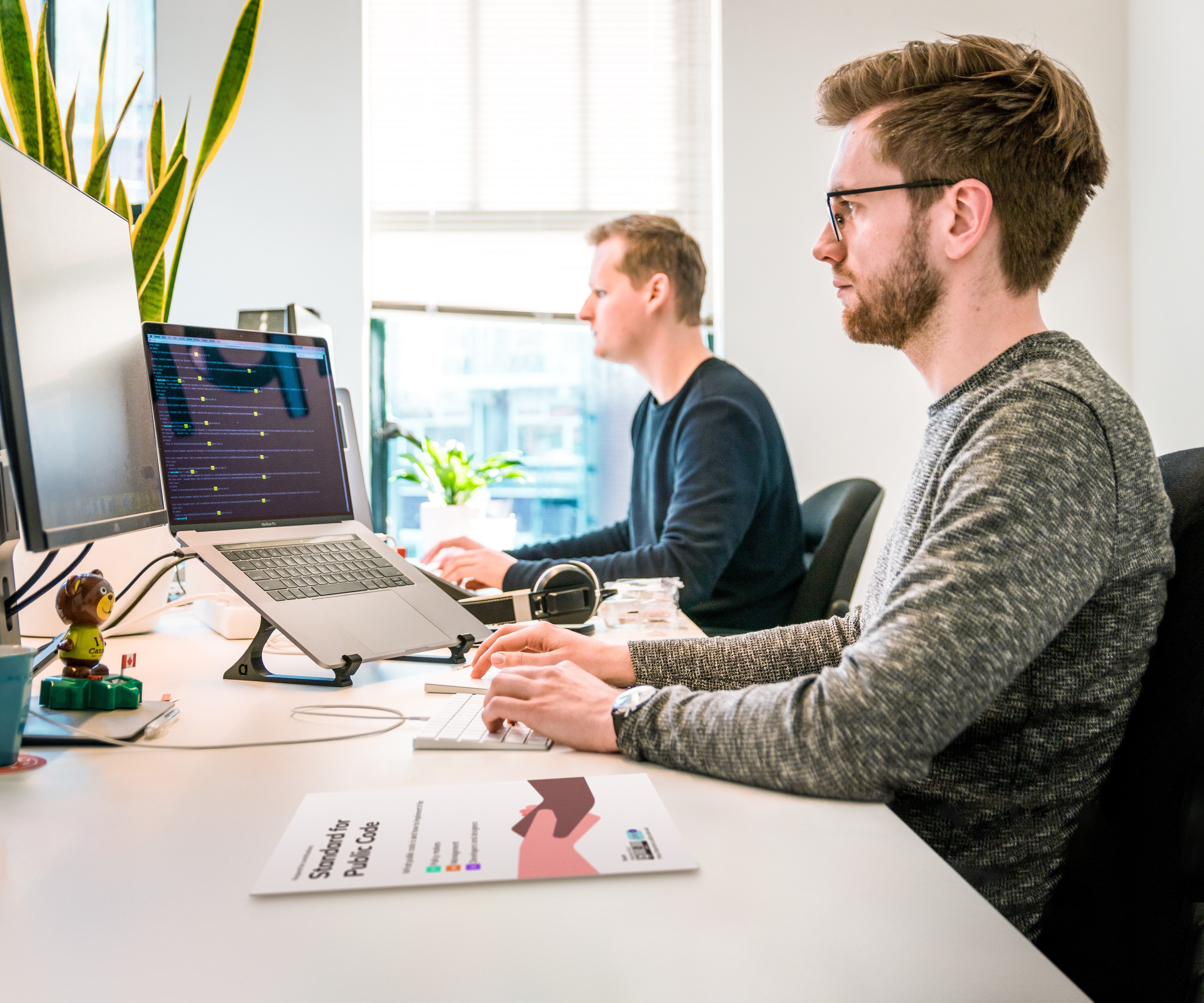 The Standard for Public Code on a developer's desk