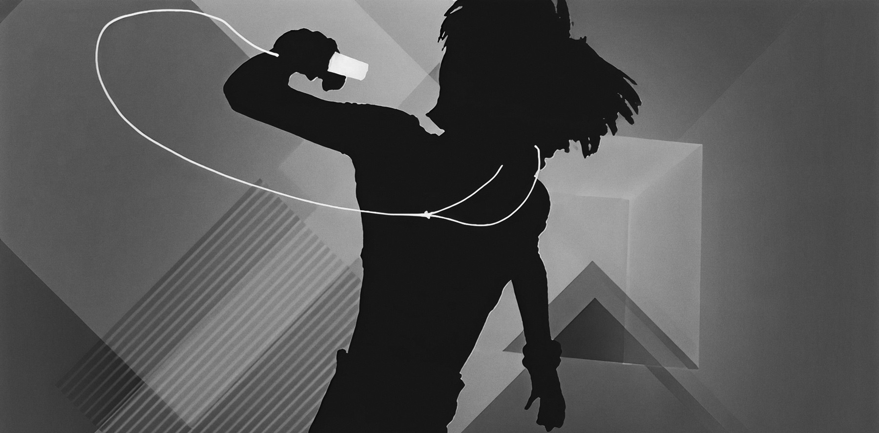A dancer holding an iPod