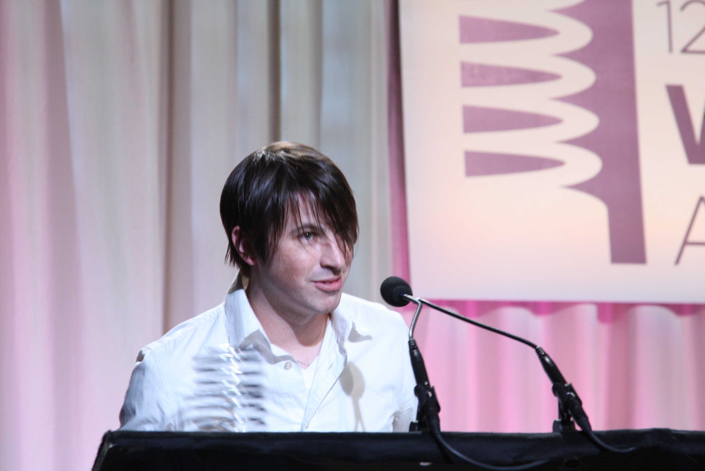 A man making an award speech